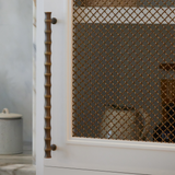 Grove Bamboo Cabinet Handle — Satin antique, satin lacquer. Design by Sophie Paterson Interiors.