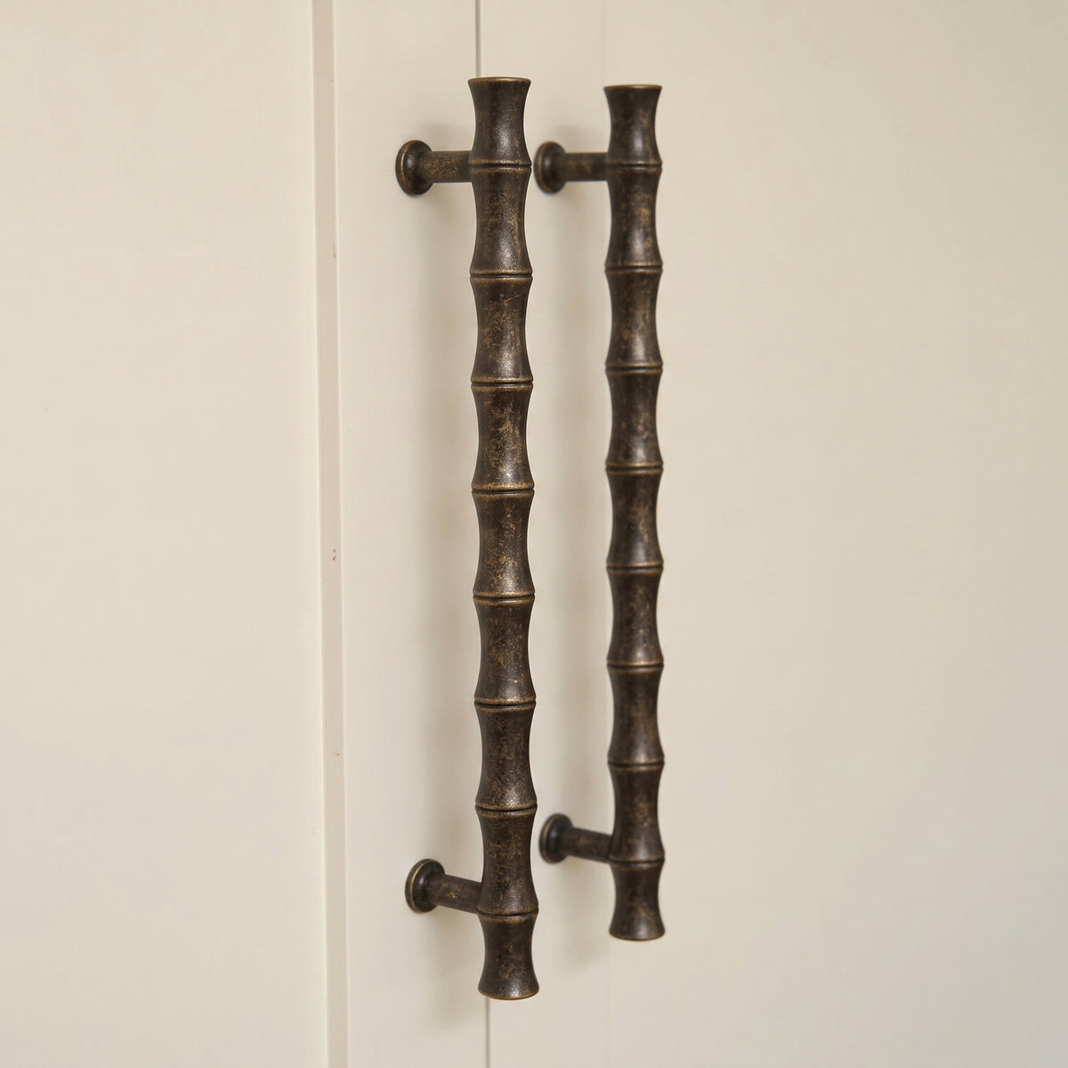Grove Bamboo Cabinet Handle — room setting, Dark aged brass
