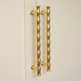 Grove Bamboo Cabinet Handle — room setting, Polished brass lacquered